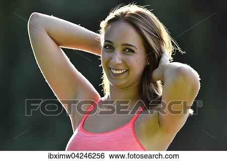 Junge Frau, Portrat im Gegenlicht, Deutschland, Europa View Large Photo Image Stock Photograph - Junge Frau, Portrat im Gegenlicht, Deutschland, Europa. Fotosearch