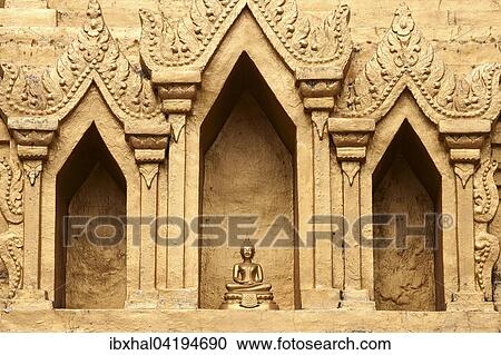 Kleine Buddhafigur in einer Nische des Wat Jong Kham, Kyaing Tong, Goldenes Dreieck, Shan-Staat, Myanmar, Asien View Large Photo Image Stock Image - Kleine Buddhafigur in einer Nische des Wat Jong Kham, Kyaing Tong, Goldenes Dreieck, Shan-Staat, Myanmar, Asien. Fotosearch
