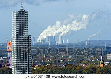 Kolnturm im Mediapark, hinten RWE Kohlekraftwerk Neurath, Grevenbroich, Koln, Nordrhein-Westfalen, Deutschland, Europa View Large Photo Image Stock Photograph - Kolnturm im Mediapark, hinten RWE Kohlekraftwerk Neurath, Grevenbroich, Koln, Nordrhein-Westfalen, Deutschland, Europa. Fotosearch