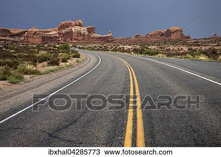 Kurvige Strasse, Arches Scenic Drive, hinten Rock Pinnacles, Gewitterstimmung, Gewitterwolken, Arches National Park, Utah, USA, Nordamerika View Large Photo Image Stock Image - Kurvige Strasse, Arches Scenic Drive, hinten Rock Pinnacles, Gewitterstimmung, Gewitterwolken, Arches National Park, Utah, USA, Nordamerika. Fotosearch