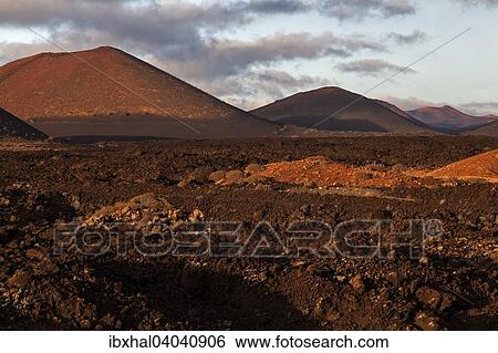 Lavafeld, Feuerberge, Vulkane, Vulkanlandschaft, Nationalpark Timanfaya, Abendlicht, Lanzarote, Kanarische Inseln, Spanien, Europa View Large Photo Image Stock Photograph - Lavafeld, Feuerberge, Vulkane, Vulkanlandschaft, Nationalpark Timanfaya, Abendlicht, Lanzarote, Kanarische Inseln, Spanien, Europa. Fotosearch