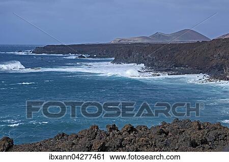Lavakuste, Brandung, bei Los Hervideros, Lanzarote, Kanarische Inseln, Spanien, Europa View Large Photo Image Stock Image - Lavakuste, Brandung, bei Los Hervideros, Lanzarote, Kanarische Inseln, Spanien, Europa. Fotosearch