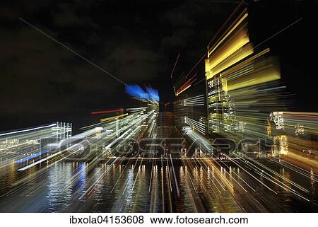 Stock Photo - Lichtstrahlen uber der Borsenstadt Frankfurt am Main bei Nacht, Frankfurt a. M., Hessen, Deutschland, Europa. Fotosearch