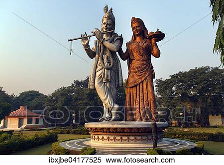 Stock Photography - Lord Krishna and Radha Statue, Shiv Murti Mandir Complex am Indira Gandhi International Airport, Neu-Delhi, Delhi, Indien, Asien. Fotosearch