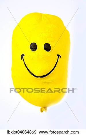 Luftballon, gelb, mit freundlichem Smiley-Gesicht, geschrumpft View Large Photo Image Stock Photo - Luftballon, gelb, mit freundlichem Smiley-Gesicht, geschrumpft. Fotosearch