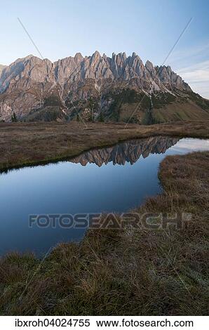 Mandlwande am Morgen mit Spiegelung, Salzburg, Osterreich, Europa View Large Photo Image Stock Photography - Mandlwande am Morgen mit Spiegelung, Salzburg, Osterreich, Europa. Fotosearch