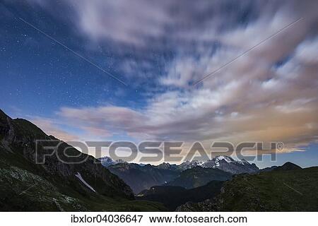 Marmolada-Gletscher, sternenklare Nacht mit Wolken, Passo di Giau, Dolomiten, Venetien, Italien, Europa View Large Photo Image Stock Photo - Marmolada-Gletscher, sternenklare Nacht mit Wolken, Passo di Giau, Dolomiten, Venetien, Italien, Europa. Fotosearch