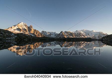 Mont Blanc Massiv spiegelt sich im Lac de Chesery, links Aiguilles de Chamonix, rechts Mont Blanc, Chamonix, Frankreich, Europa View Large Photo Image Picture - Mont Blanc Massiv spiegelt sich im Lac de Chesery, links Aiguilles de Chamonix, rechts Mont Blanc, Chamonix, Frankreich, Europa. Fotosearch