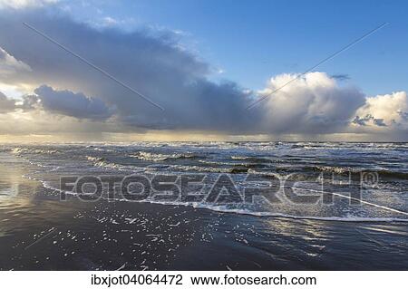 Nordseestrand, aufgewuhlte See, Wolkenberge, bei einem Herbststurm, De Haan, Flandern, Belgien, Europa View Large Photo Image Stock Image - Nordseestrand, aufgewuhlte See, Wolkenberge, bei einem Herbststurm, De Haan, Flandern, Belgien, Europa. Fotosearch