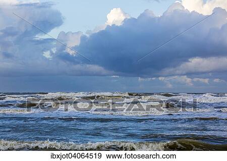 Nordseestrand, aufgewuhlte See, Wolkenberge, bei einem Herbststurm, De Haan, Flandern, Belgien, Europa View Large Photo Image Stock Photo - Nordseestrand, aufgewuhlte See, Wolkenberge, bei einem Herbststurm, De Haan, Flandern, Belgien, Europa. Fotosearch