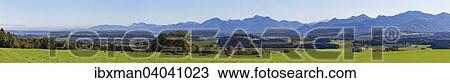 Panorama-Ausblick von Ratzinger Hohe uber den Chiemsee, in der Mitte Kirche von Greimharting, hinten die Chiemgauer Alpen, Chiemgau, Alpenvorland, Oberbayern, Bayern, Deutschland, Europa View Large Photo Image Stock Image - Panorama-Ausblick von Ratzinger Hohe uber den Chiemsee, in der Mitte Kirche von Greimharting, hinten die Chiemgauer Alpen, Chiemgau, Alpenvorland, Oberbayern, Bayern, Deutschland, Europa. Fotosearch