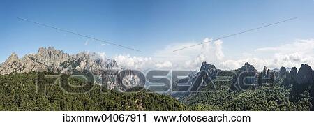 Panorama, Blick uber ein Tal, Bergflanken mit felsigen Bergspitzen umgeben von Kiefern Wald, Klippen, Col de Bavella, Bavella-Massiv, Korsika, Frankreich, Europa View Large Photo Image Stock Image - Panorama, Blick uber ein Tal, Bergflanken mit felsigen Bergspitzen umgeben von Kiefern Wald, Klippen, Col de Bavella, Bavella-Massiv, Korsika, Frankreich, Europa. Fotosearch