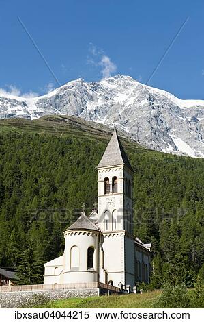 Pfarrkirche St. Gertraud, dahinter Gipfel des Ortler, 3905 m, Ortles, Sulden, Solda, Ortler-Alpen, Trentino-Sudtirol, Italien, Europa View Large Photo Image Stock Photography - Pfarrkirche St. Gertraud, dahinter Gipfel des Ortler, 3905 m, Ortles, Sulden, Solda, Ortler-Alpen, Trentino-Sudtirol, Italien, Europa. Fotosearch