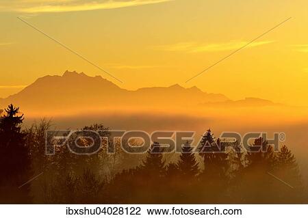 Pilatus uber dem Nebelmeer im Abendrot, Kanton Zug, Schweiz, Europa View Large Photo Image Stock Image - Pilatus uber dem Nebelmeer im Abendrot, Kanton Zug, Schweiz, Europa. Fotosearch