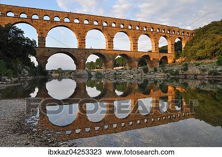 Romisches Aquadukt Pont du Gard uber den Gardon am Abend, Remoulins, Provence, Sudfrankreich, Frankreich, Europa View Large Photo Image Stock Image - Romisches Aquadukt Pont du Gard uber den Gardon am Abend, Remoulins, Provence, Sudfrankreich, Frankreich, Europa. Fotosearch