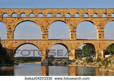 Romisches Aquadukt Pont du Gard uber den Gardon, Remoulins, Provence, Sudfrankreich, Frankreich, Europa View Large Photo Image Stock Image - Romisches Aquadukt Pont du Gard uber den Gardon, Remoulins, Provence, Sudfrankreich, Frankreich, Europa. Fotosearch