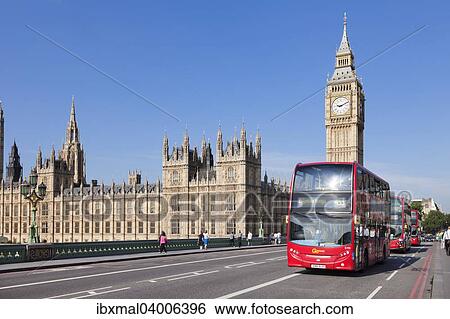Stock Photograph - Rote Doppeldeckerbusse auf der Westminster Bridge mit Big Ben und Houses of Parliament, London, England, Grossbritannien, Europa. Fotosearch