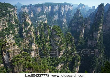 Sandsteinturme, in den Bergen von Zhangjiajie, Wulingyuan National Park, Hunan Provinz, China, Asien View Large Photo Image Stock Photo - Sandsteinturme, in den Bergen von Zhangjiajie, Wulingyuan National Park, Hunan Provinz, China, Asien. Fotosearch