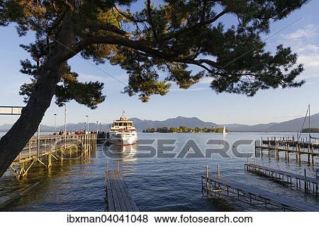 Schiffsanleger in Gstadt und Fraueninsel, Chiemsee, Chiemgau, Oberbayern, Bayern, Deutschland, Europa View Large Photo Image Stock Photo - Schiffsanleger in Gstadt und Fraueninsel, Chiemsee, Chiemgau, Oberbayern, Bayern, Deutschland, Europa. Fotosearch
