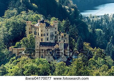 Schloss Hohenschwangau, hinten Schwansee, Schwangau, Konigswinkel, Ostallgau, Allgau, Schwaben, Bayern, Deutschland, Europa View Large Photo Image Stock Photo - Schloss Hohenschwangau, hinten Schwansee, Schwangau, Konigswinkel, Ostallgau, Allgau, Schwaben, Bayern, Deutschland, Europa. Fotosearch