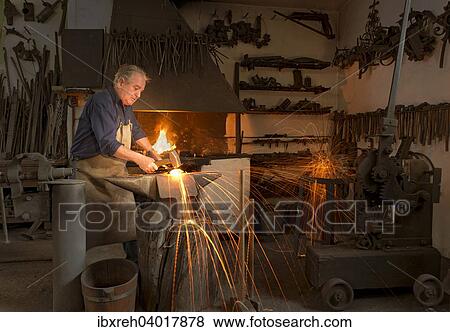 Schlossermeister Ernst Stauder beim Schmieden, Schlosserei Ernst Stauder, Schwaz, Tirol, Osterreich, Europa View Large Photo Image Stock Photo - Schlossermeister Ernst Stauder beim Schmieden, Schlosserei Ernst Stauder, Schwaz, Tirol, Osterreich, Europa. Fotosearch