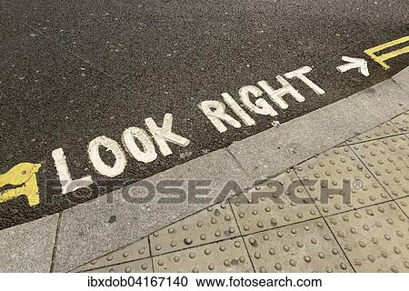 Schriftzug Look Right auf der Strasse, Hinweis auf Linksverkehr, London, England, Grossbritannien, Europa View Large Photo Image Stock Image - Schriftzug Look Right auf der Strasse, Hinweis auf Linksverkehr, London, England, Grossbritannien, Europa. Fotosearch