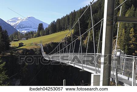 Seilhangebrucke uber das Hohenbachtal mit einer Lange von 200, 51 m und einer Hohe von 105 m, Holzgau, Lechtal, Tirol, Osterreich, Europa View Large Photo Image Stock Photo - Seilhangebrucke uber das Hohenbachtal mit einer Lange von 200, 51 m und einer Hohe von 105 m, Holzgau, Lechtal, Tirol, Osterreich, Europa. Fotosearch