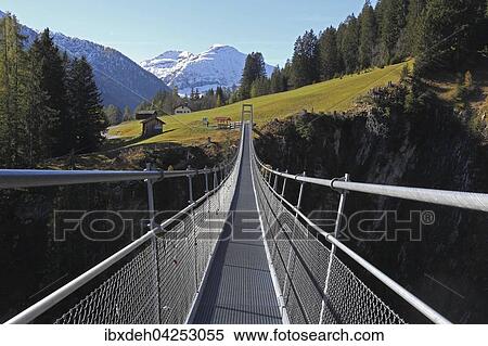 Stock Photography - Seilhangebrucke uber das Hohenbachtal mit einer Lange von 200, 51 m und einer Hohe von 105 m, Holzgau, Lechtal, Tirol, Osterreich, Europa. Fotosearch