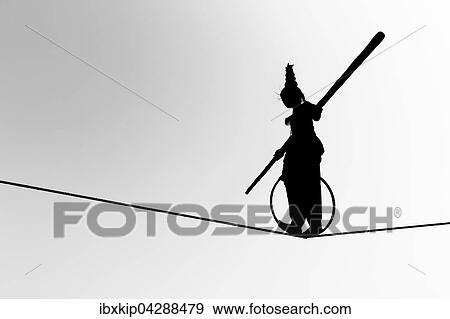 Silhouette, Madchen balanciert auf einem Seil, Pushkar, Rajasthan, Indien, Asien View Large Photo Image Stock Photo - Silhouette, Madchen balanciert auf einem Seil, Pushkar, Rajasthan, Indien, Asien. Fotosearch