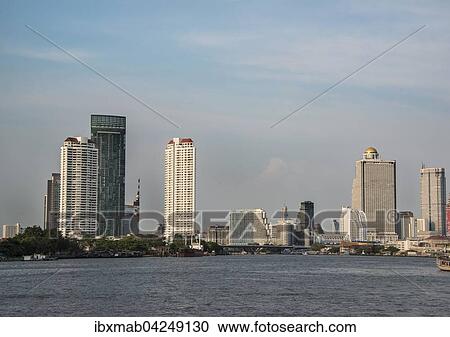 Skyline, Fluss Mae Nam Chao Phraya mit Hochhausern, Bangkok, Thailand, Asien View Large Photo Image Stock Image - Skyline, Fluss Mae Nam Chao Phraya mit Hochhausern, Bangkok, Thailand, Asien. Fotosearch