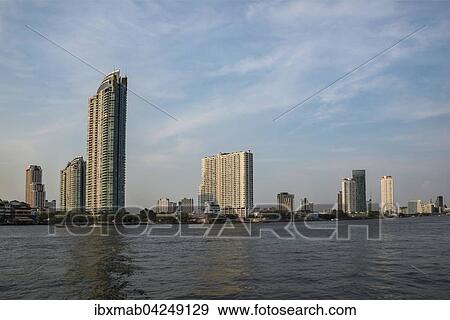 Skyline, Fluss Mae Nam Chao Phraya mit Hochhausern, Bangkok, Thailand, Asien View Large Photo Image Stock Photo - Skyline, Fluss Mae Nam Chao Phraya mit Hochhausern, Bangkok, Thailand, Asien. Fotosearch