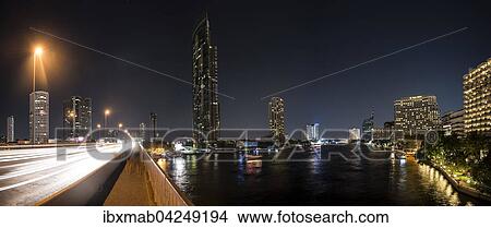 Skyline mit Brucke uber den Fluss Mae Nam Chao Phraya bei Nacht, Bangkok, Thailand, Asien View Large Photo Image Picture - Skyline mit Brucke uber den Fluss Mae Nam Chao Phraya bei Nacht, Bangkok, Thailand, Asien. Fotosearch