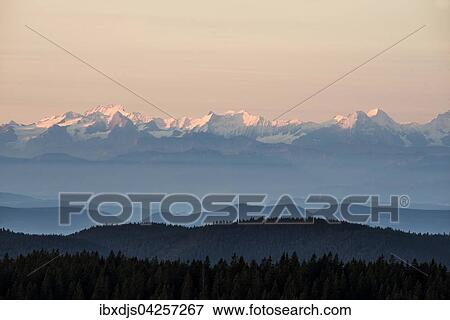 Sonnenaufgang, Ausblick nach Suden auf die Schweizer Alpen vom Feldberg, Schwarzwald, Baden-Wurttemberg, Deutschland, Europa View Large Photo Image Stock Photo - Sonnenaufgang, Ausblick nach Suden auf die Schweizer Alpen vom Feldberg, Schwarzwald, Baden-Wurttemberg, Deutschland, Europa. Fotosearch