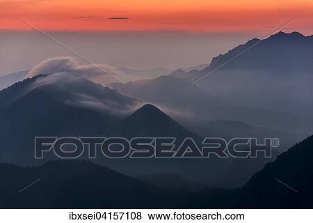 Stock Photo - Sonnenaufgang uber den Bayerischen Alpen, Herzogstand, Oberbayern, Bayern, Deutschland, Europa. Fotosearch