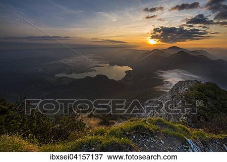 Sonnenaufgang uber Kochelsee und Bayerischen Alpen, Herzogstand, Walchensee, Oberbayern, Bayern, Deutschland, Europa View Large Photo Image Stock Photo - Sonnenaufgang uber Kochelsee und Bayerischen Alpen, Herzogstand, Walchensee, Oberbayern, Bayern, Deutschland, Europa. Fotosearch