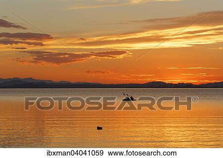 Sonnenuntergang am Chiemsee, bei Chieming, Chiemgau, Oberbayern, Bayern, Deutschland, Europa View Large Photo Image Stock Photo - Sonnenuntergang am Chiemsee, bei Chieming, Chiemgau, Oberbayern, Bayern, Deutschland, Europa. Fotosearch