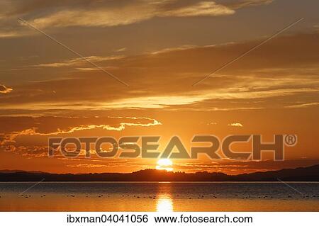 Sonnenuntergang am Chiemsee, bei Chieming, Chiemgau, Oberbayern, Bayern, Deutschland, Europa View Large Photo Image Stock Photograph - Sonnenuntergang am Chiemsee, bei Chieming, Chiemgau, Oberbayern, Bayern, Deutschland, Europa. Fotosearch