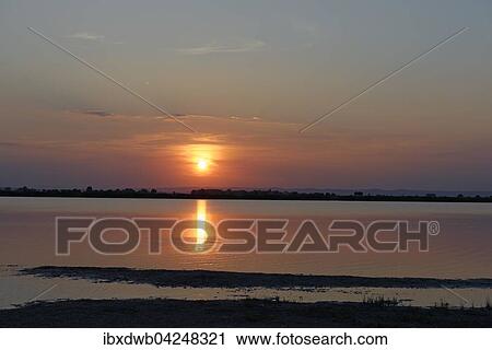 Sonnenuntergang an der Lacke Darscho bei Apetlon Illmitz, Nationalpark Neusiedler See, Seewinkel, Burgenland, Osterreich, Europa View Large Photo Image Stock Image - Sonnenuntergang an der Lacke Darscho bei Apetlon Illmitz, Nationalpark Neusiedler See, Seewinkel, Burgenland, Osterreich, Europa. Fotosearch