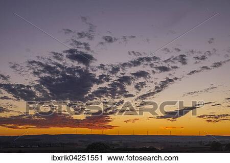 Sonnenuntergang mit Wolken, Windrader, Hassberge, Unterfranken View Large Photo Image Stock Image - Sonnenuntergang mit Wolken, Windrader, Hassberge, Unterfranken. Fotosearch