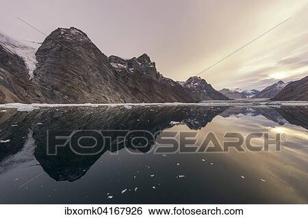 Spiegelung, Berge und Eisberge, Kaiser Franz Josef Fjord, Nordost-Gronland-Nationalpark, Gronland, Nordamerika View Large Photo Image Stock Photograph - Spiegelung, Berge und Eisberge, Kaiser Franz Josef Fjord, Nordost-Gronland-Nationalpark, Gronland, Nordamerika. Fotosearch
