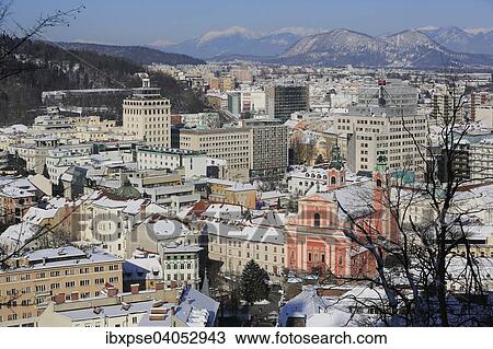 Stadtansicht mit Franziskanerkirche und dem Wolkenkratzer, hinten die Karawanken, von der Burg von Laibach aus, im Winter, Ljubljana, Slowenien, Europa View Large Photo Image Stock Image - Stadtansicht mit Franziskanerkirche und dem Wolkenkratzer, hinten die Karawanken, von der Burg von Laibach aus, im Winter, Ljubljana, Slowenien, Europa. Fotosearch