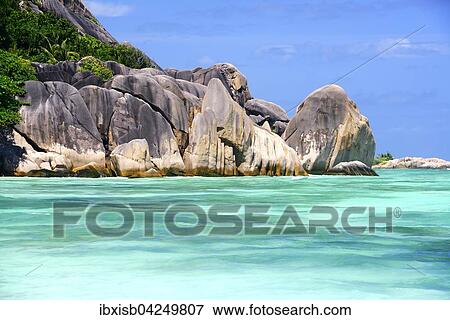 Stock Photo - Strand und Granitfelsen am Strand Anse La Reunion, Insel La Digue, Seychellen, Afrika. Fotosearch