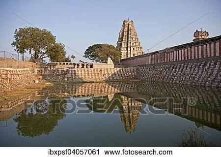 Tempelteich und Gopuram des Virupaksha-Tempels, Hampi, Karnataka, Indien, Asien View Large Photo Image Stock Image - Tempelteich und Gopuram des Virupaksha-Tempels, Hampi, Karnataka, Indien, Asien. Fotosearch