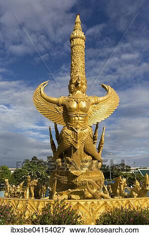 Thung Si Muang Park, Mueang, Garuda-Figur vor der Goldenen Riesen-Kerze, Kerzen-Monument, Ubon Ratchathani, Isan, Isaan, Thailand, Asien View Large Photo Image Stock Photo - Thung Si Muang Park, Mueang, Garuda-Figur vor der Goldenen Riesen-Kerze, Kerzen-Monument, Ubon Ratchathani, Isan, Isaan, Thailand, Asien. Fotosearch
