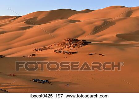 Touristencamp in Sanddunen, Oued In Djerane, Tassili n'Ajjer Nationalpark, UNESCO Weltnaturerbe, Sahara, Algerien, Afrika View Large Photo Image Stock Photo - Touristencamp in Sanddunen, Oued In Djerane, Tassili n'Ajjer Nationalpark, UNESCO Weltnaturerbe, Sahara, Algerien, Afrika. Fotosearch