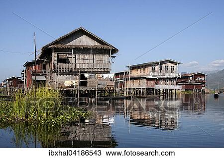 Traditionelle Stelzenhauser im Inle-See, Spiegelung im Wasser, Shan-Staat, Myanmar, Asien View Large Photo Image Stock Image - Traditionelle Stelzenhauser im Inle-See, Spiegelung im Wasser, Shan-Staat, Myanmar, Asien. Fotosearch