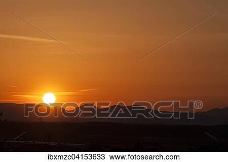 Untergehende Sonne, die Vogesen als Silhouette, Ringsheim, Baden-Wurttemberg, Deutschland, Europa View Large Photo Image Stock Image - Untergehende Sonne, die Vogesen als Silhouette, Ringsheim, Baden-Wurttemberg, Deutschland, Europa. Fotosearch
