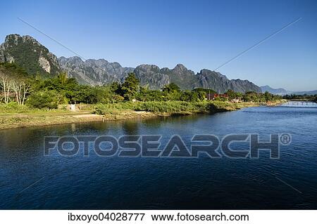 Stock Photo - Vang Vieng Kalksteinkarstlandschaft, am Fluss Nam Song oder River Song, Viengkeo, Vang Vieng, Laos, Asien. Fotosearch
