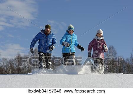Vater und zwei Kinder laufen im tiefen Schnee, Bad Heilbrunn, Oberbayern, Bayern, Deutschland, Europa View Large Photo Image Stock Photograph - Vater und zwei Kinder laufen im tiefen Schnee, Bad Heilbrunn, Oberbayern, Bayern, Deutschland, Europa. Fotosearch