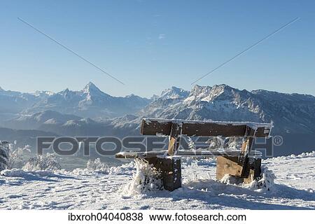 Verschneite Bank vor Alpenpanorama, hinten links Watzmann, hinten rechts Untersberg, Gaisberg, Salzburg, Osterreich, Europa View Large Photo Image Stock Photo - Verschneite Bank vor Alpenpanorama, hinten links Watzmann, hinten rechts Untersberg, Gaisberg, Salzburg, Osterreich, Europa. Fotosearch